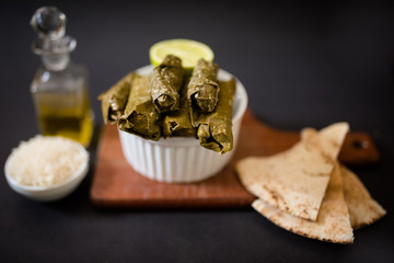 Obraz na płótnie Canvas Arabian food Cigar cigar from grape leaf
