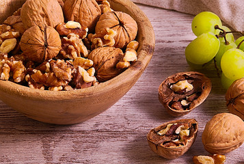Group of walnuts and grapes