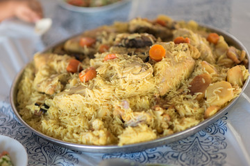 Maqluba traditional Arab food.The dish includes meat, rice, and