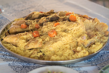 Maqluba traditional Arab food.The dish includes meat, rice, and