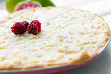 Homemade cookie with raspberry and fig on the white wood desk