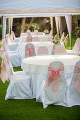 table set for wedding or another catered event dinner, luxury wedding table setting for fine dining at outdoors