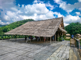 The wooden raft in the water reservoirs and mountain views.