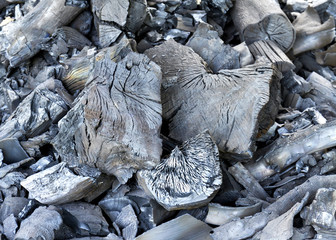 Close up pile of black wood charcoal