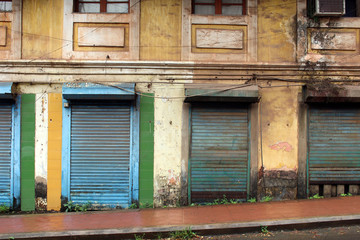 Fototapeta na wymiar Translation: the vintage and colorful windows and doors in Goa City