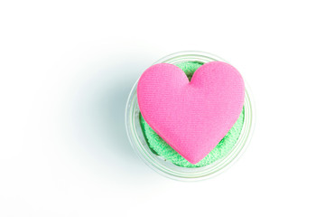 Pink heart on white background with copy space,soft focus.