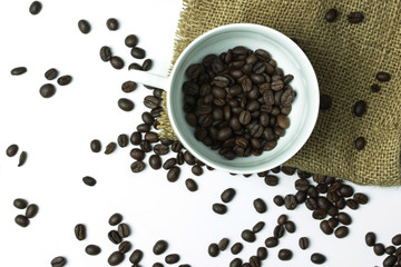 Cup and coffee bean  on white background.