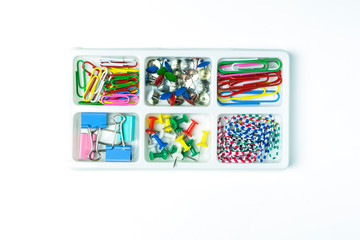 Colorful of paperclip and other in box,white background.