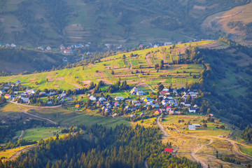 view to a small village in the mountain valley
