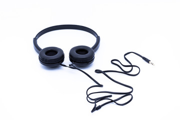 Naklejka premium Black headphones on a white background
