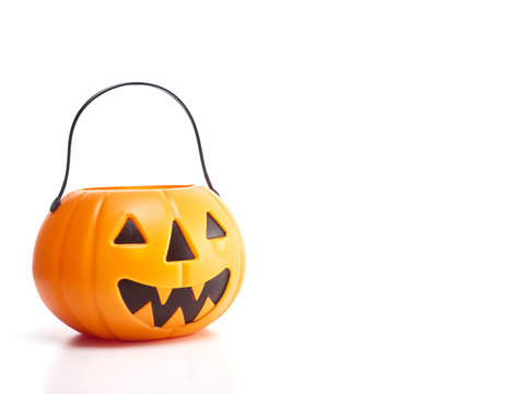 plastic jack-o-lantern on white