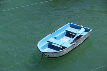 Fototapeta na wymiar Blue small boat