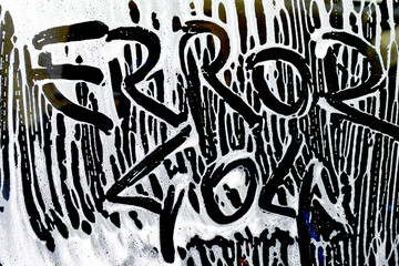 text error 404 on a car wash foam patterns on a car window