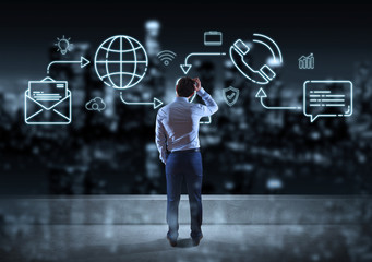 Businessman watching thin line social network icons interface