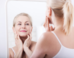 Fourty years. Wrinkles on forehead and face. Face plastic.