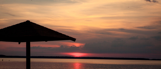 Beautiful summer sunset in the lake Svityaz. Sunset Background