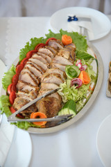 catering food, cold pork cuts on a platter