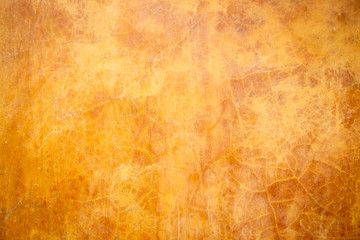 Beautiful ancient empty wall painted in orange color.