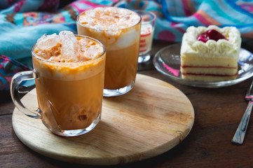 thai tea milkshank sweet drink on the glass for refreshment