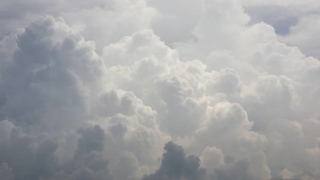 close up of a storm fluffy clouds moving during day . fast motion timelapse