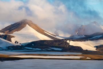 Snowed summer hiking trails near the Hrafntinnusker (Obsidian Reef) Campsite  in the Fjallabak...