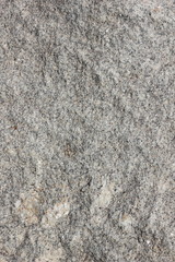 Granite background. Texture of gray granite stone. Natural pattern in gray tones. Abstract background
