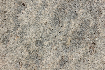 Granite background. Texture of gray granite stone. Natural pattern in gray tones. Abstract background