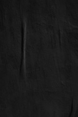 Fototapeta premium Dark black grey paper background creased crumpled surface old torn ripped posters scary grunge textures placard backdrop
