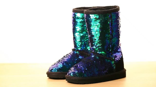 Girl shoes wooden table white background hd footage