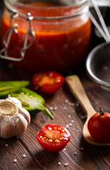 tomato sauce ketchup homemade food kitchen wooden background
