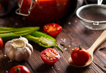 tomato sauce ketchup homemade food kitchen wooden background
