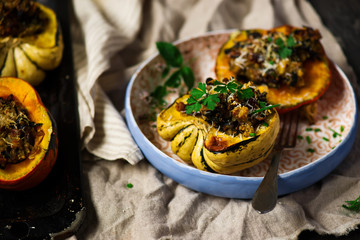 Stuffed pumpkin with millet.selective focus - obrazy, fototapety, plakaty