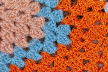 Detail of a wool blanket made with crochet