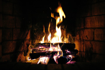 The flames in the fireplace