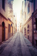 Obraz na płótnie Canvas Deserted alley in a italian old city