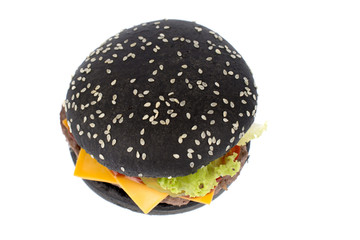 Black, charcoal bun hamburger on a white background