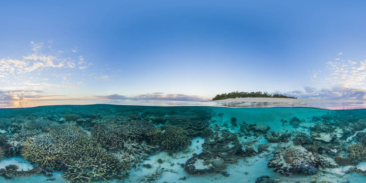 Island with coral reef at sunrise on Great Barrier Reef, split photo