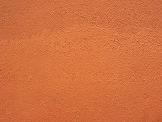 Fototapeta premium orange plaster wall background