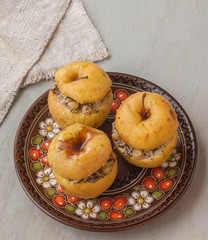 Baked apples with raisin, poppy seeds, rice and honey. Flat Lay