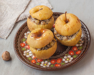 Baked apples with raisin, poppy seeds, rice and honey. Flat Lay