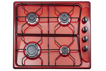 Red kitchen surface with black metal grill. View from above.