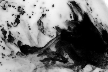 Abstract ink background. Marble style. Black paint stroke texture on white paper. Grunge mud art. Macro image of pen juice. Dark Smear.