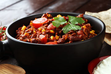 Hot chili con carne. mexican food tasty and spicy.
