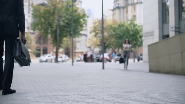 Business lady in elegant suit walking to work, successful career, busy lifestyle