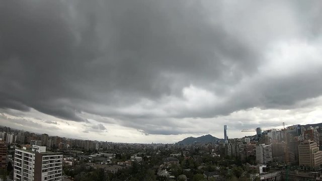 Time lapse of clouds and wind at a city