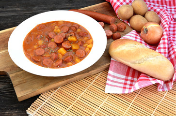 Potato goulash with Debreziner sausage or German name is Kartoffelgulasch mit Debreziner