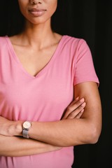  women in pink crossing their arms for breast cancer