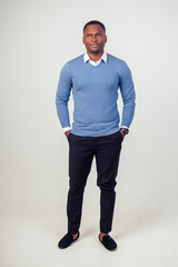 Fototapeta premium african american stylish business man at the workspace office on white background in studio shot
