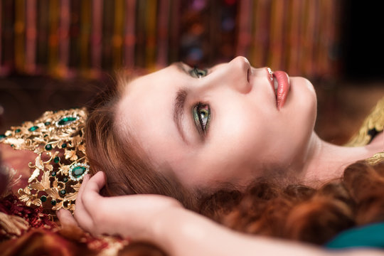 Girl at the image of Turkish sultan's wife