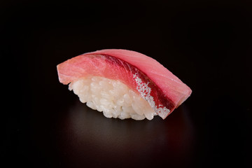 White fish nigiri sushi isolated on black background
